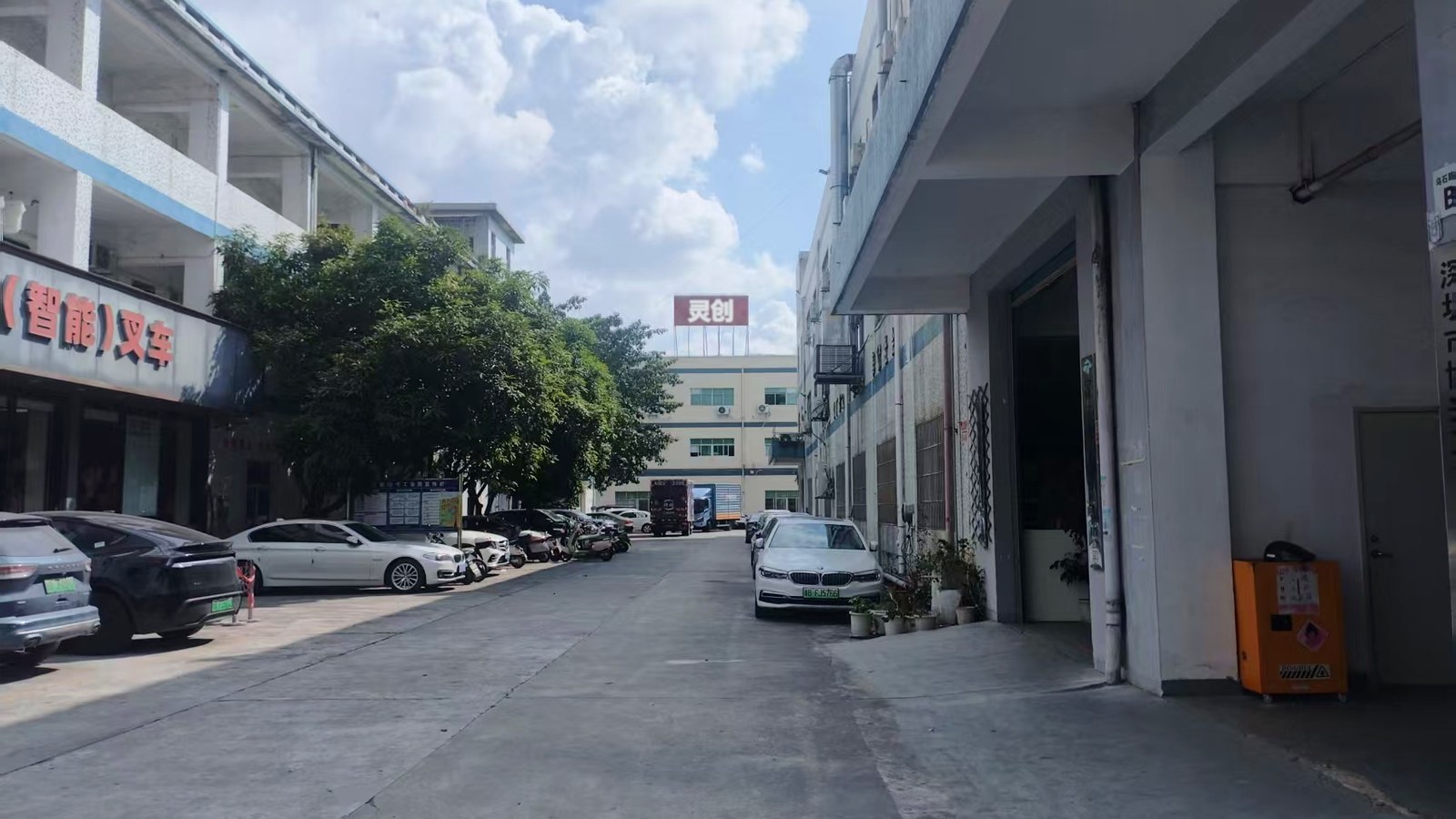 Wide view of the Lingvent Design production base in Guangdong, China, showing the main building and factory yard