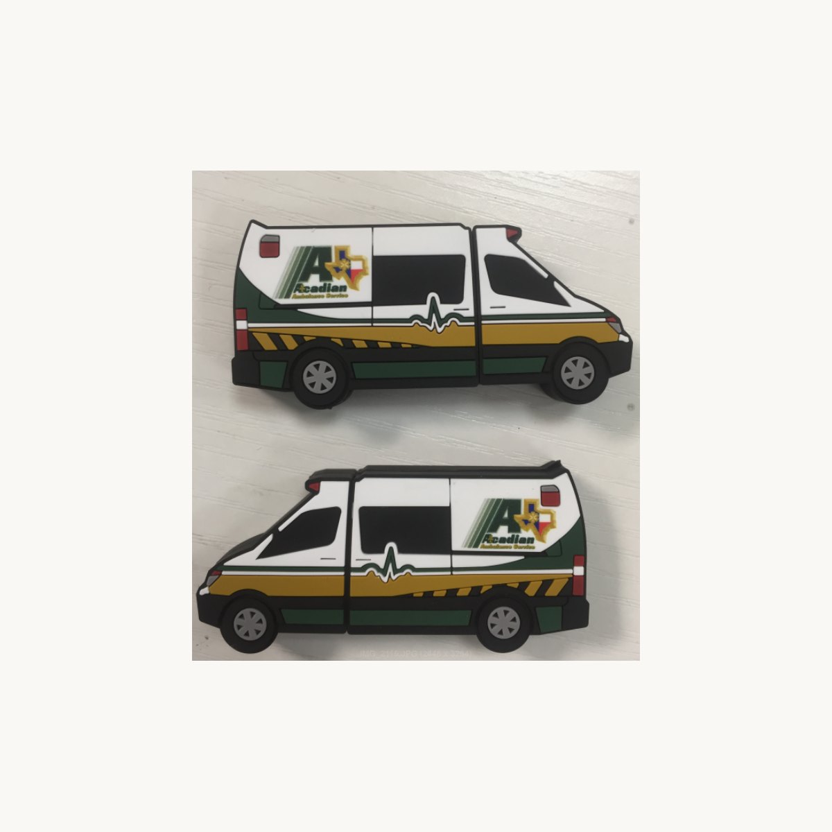 Soft PVC figure moulded as a white delivery van, shown front and back