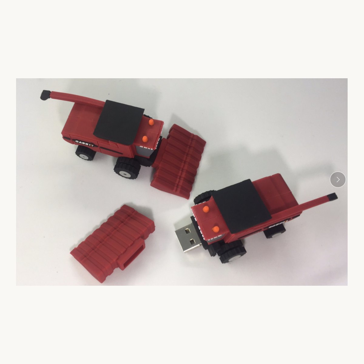 Soft PVC USB casing moulded as a construction truck with the USB connector exposed